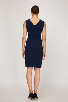 This Alyssa dress is the perfect addition to your work wardrobe. Its classic silhouette and sleek style will make you feel beautiful, while its v-neck gives you a touch of elegance. The pockets are functional, allowing you to carry your necessities wherever you go! Made from a lightweight fabric that's fully lined for an extra layer of protection, this dress allows you to be comfortable at any time of the day. Signature Stretch Crepe Fabric Back zipper, hook-and-eye-closure 98% polyester, 2% spa Classic V-neck Mini Dress For Semi-formal Occasions, Fitted V-neck Dress With Back Zipper, Classic H-line Office Dresses, Classic V-neck Semi-formal Dress, Elegant V-neck Bodycon Dress With Back Zipper, Elegant Fitted V-neck Dress With Flattering Silhouette, V-neck Midi Dress With Fitted Bodice, V-neck Elastane Dress With Flattering Silhouette, Fitted Bodice V-neck Dress For Work