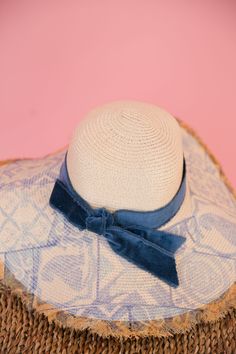 Shade yourself in style with THE VENICE SUN HAT. Made from durable straw, this sun hat features a unique blue Italian design print and a charming velvet bow band. Perfect for adding a touch of fun to any summer outfit. This hat is ONE OF A KIND, created by our owner Stephanie. To receive item quicker, expedited shipping is available at checkout. Luxury Summer Hat With Ribbon, Luxury Summer Hats For Vintage Events, Luxury Vintage Hat For Vacation, Luxury Vintage Boater Hat For Beach, Velvet Bow, Sun Hat, Italian Design, Summer Outfit, Sun Hats