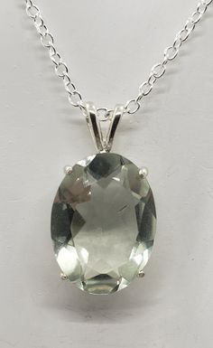 This beautiful natural 16x12mm Green Amethyst is set in a Sterling Silver pendant and comes with an 18inch Silver chain. The mannequin is about 3/4 the size of an adult. Green Amethyst, Sterling Silver Necklace, Sterling Silver Pendant, Sterling Silber, Sterling Silver Necklaces, Sterling Silver Pendants, Pendant Necklaces, Silver Pendant, Silver Chain