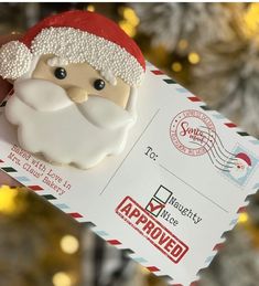 a close up of a person holding a fake santa clause