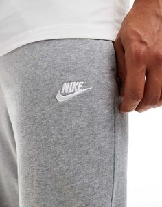 Joggers by Nike For 'no plans' plans Drawstring waistband Side pockets Logo embroidery Fitted cuffs Regular fit Gray Sweatpants With Comfort Waistband, Nike Gray Athleisure Joggers, Nike Gray Bottoms With Elastic Waistband, Nike Gray Cotton Joggers, Nike Gray Cotton Sweatpants, Gray Sportswear Joggers With Ribbed Cuffs, Casual Gray Nike Joggers, Nike Gray Sportswear Sweatpants, Nike Gray Pants For Loungewear