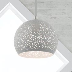 a gray and white light hanging from a ceiling