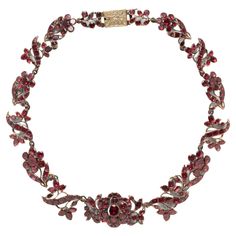 Antique Georgian foil-back garnet necklace, circa 1850 Designed as flowers set with foil-back garnets, in a fitted box Size: width 0.88 inch, length 14.25 inches Total weight: 44.2 grams Antique Jewelry Necklace, Back Necklace, Garnet Necklace, Gothic Jewelry, Antique Jewellery, Link Necklace, Beautiful Jewelry, Garnet, Georgia