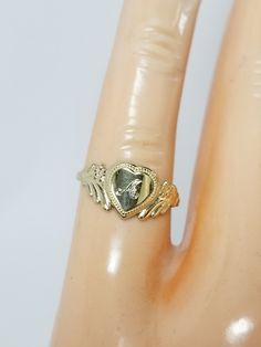 "Thanks for shopping our vintage estate store. We tend to sell well below wholesale and truly hope you enjoy all of our items. Many of the items are one of a kind, so please enjoy scrolling through the pictures and hopefully something will catch your eye. Brown spots are from camera or reflections. Estate 14k yellow gold monogram cursive capital A heart ring. Custom made ring for our shop. Ring size: 3 Setting: 7.5mm 1/4\" to 3/8\" Band width: 1.4mm Weight: 1.12 grams Marked 14k and it's sweet. Vintage Gold Initial Ring Stamped 14k, Vintage Gold Engraved Ring, Tarnish Resistant, Vintage Gold Engraved Tarnish-resistant Ring, Vintage Gold Engraved Ring Tarnish Resistant, Vintage Tarnish Resistant Signet Ring For Promise, Vintage Tarnish-resistant Signet Ring For Promise, Personalized Yellow Gold Signet Ring Collectible, Personalized Engraved Yellow Gold Ring For Collectors, Vintage Tarnish Resistant Initial Ring For Anniversary