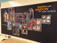 a wall that has pictures on it with the words reading in your window to a new world