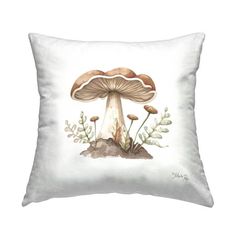 a white pillow with mushrooms on it