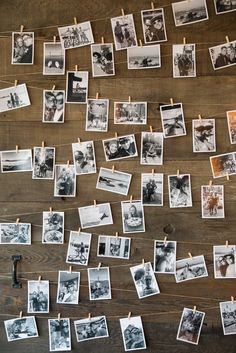 many old photos are hung on clothes pins