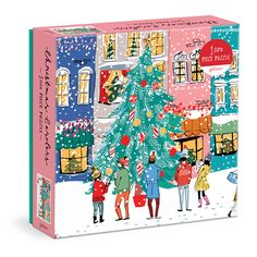 a puzzle box with people around a christmas tree