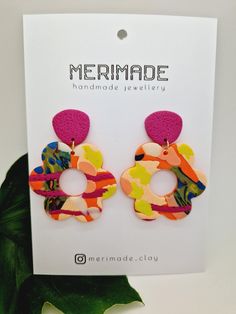 Colourful and cheerful, these earrings are handmade with polymer clay. Great addition to any outfit to bring a pop of colour into your day. Please check the image carefully as each earring is unique and due to the properties of the clay some imperfections may appear. If you are unhappy with your purchase I will gladly refund you as per the policy. Care instructions: keep these earrings away from direct heat as the clay may soften. Vibrant Colorful Earrings For Gifts, Playful Handmade Multicolor Flower Earrings, Playful Multicolor Handmade Flower Earrings, Playful Hand Painted Pink Earrings, Fun Pink Polymer Clay Earrings, Trendy Colorful Earrings As Gift, Trendy Colorful Earrings For Gift, Playful Handmade Flower Earrings, Colorful Handmade Flower Earrings Gift