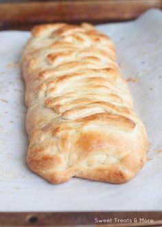 a piece of bread sitting on top of a baking sheet