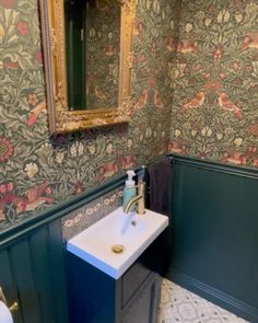 a bathroom with a dark green wall with panelling and floral wallpaper Bathroom Transformation, Elegant Bathroom, Art Deco Inspired, Feel Inspired, Gold Accents, New Color