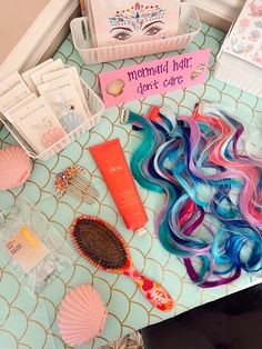 mermaid hair and other items on a table