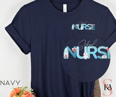 Get ready for back to school with this customized School Nurse T-shirt or celebrate your favorite Nurse with a personalized gift. Image shows "School" Nurse, but can be customized for any Nurse. Made from soft, high-quality cotton, this T-shirt is comfortable for all-day wear. Features: Personalized Nurse Type (Example: School Nurse) High-Quality Material: Crafted from premium, breathable cotton that ensures comfort and durability. Variety of Colors: Available in multiple colors to suit every nu Customizable Crew Neck School T-shirt, Customizable Blue T-shirt For School Spirit, Crew Neck Cotton Sublimation Design For School, Blue Crew Neck T-shirt For Back To School, Customizable Crew Neck T-shirt For School, Blue Custom Print T-shirt For School, Nurse Tshirt, Fun School, Cute Nurse