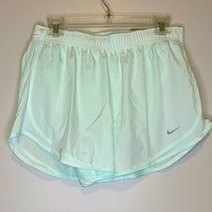 Nwt Nike Women’s Running Shorts Large Light Mint Color Small Pocket And Shorts Insert Drawstring Waistband Dry Fit Sports Pants With Built-in Shorts For Spring, Nike Stretch Bottoms For Spring, Nike Bottoms With Elastic Waistband And Short Leg, Nike Fitted Bottoms For Summer, Nike Athleisure Pants For Summer, Nike Bottoms For Beach And Spring Season, Nike Summer Athleisure Pants, Nike Sporty Summer Pants, Nike Short Leg Bottoms For Summer