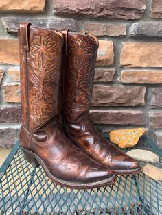 50s rainbow flower stitched detail cowboy boots made by Rodeo. Amazing condition for their age! D E T A I L S: * Size: Women's 8.5 * Maker: Rodeo * Era: 50s * Material: Leather C O N D I T I O N: * Near Perfect Vintage Condition - Soles have hardly any wear. Shafts are barely broken in. Some light discoloration on heels.  M E A S U R E M E N T S : * Sole Length: 12" * Ball: 3 1/4" * Height: 13.5" * Heel Height: 2" Get a coupon for 10% off after your first purchase! Follow @attackheartvintage on IG to see my newest items before they are listed and at a discounted price! AttackHeart Hunts. So You Can Gather. Boots Rainbow, Cowboy Boots Womens, Flower Stitch, Brown Marble, Rainbow Flower, Cowboy Boots Women, Boots Womens, Cowboy Western, Dec 8