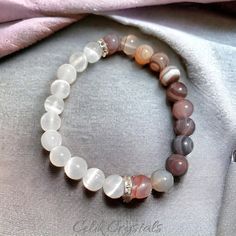 Standard Size Is 7.5 Inches. Message Me If You Would Like Any Size Between 6.5 - 8.5 Inches. -Introducing The Botswana Agate, Selenite Bracelet - A Mesmerizing Piece Of Jewelry Designed To Enhance Your Spiritual Well-Being. Crafted From Natural Stones With 8mm Stretch Beads, This Bracelet Is Not Only A Stunning Fashion Accessory But Is Also Believed To Have Spiritual Healing Properties. -The Bracelet Features Botswana Agate And Selenite Stones That Are Known By Many For Their Ability To Promote White Gemstone Beaded Bracelets For Meditation, White Agate Gemstone Bracelets, Elegant White Agate Crystal Bracelet, White Beaded Gemstone Bracelets For Everyday, Everyday White Beaded Gemstone Bracelets, White Agate Spiritual Stretch Bracelet, White Agate Bracelets With 8mm Beads, White Moonstone Bracelets For Everyday, White Moonstone Bracelet For Everyday