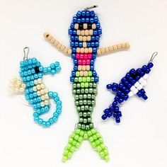 the beaded keychains are made to look like an image of a person