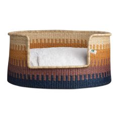 a dog bed made out of woven material