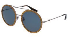 Gucci GG0061S PPHP1443 sunglasses with ruthenium and shiny glitter gold frame and solid blue lens. Influential, innovative and progressive, Gucci is reinventing a wholly modern approach to fashion. Under a new vision of creativity, the House has redefined luxury for the 21st century, further reinforcing its position as one of the world’s most desirable fashion houses. Eclectic, contemporary, romantic: Gucci products represent the pinnacle of Italian craftsmanship and are unsurpassed for their quality and attention to detail. Sun Woman, Logo Sunglasses, Chloe Kids, Blue Lens, Sunglasses Model, Sunglasses Logo, Gucci Eyewear, Gucci Logo, Round Frames