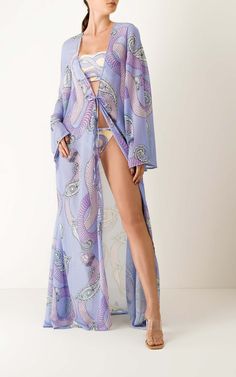 The Boho Serpent Kimono by Mola Mola is a long, elegant kimono-style coverup. Throw it over your suit or your outfit to instantly elevate your look. Features:Tie frontBell sleeves Made in Colombia Elegant Long Sleeve Beach Robe, Long Sleeve Beachwear Kaftan For Party, Elegant Long Sleeve Kimono For Beach Cover-up, Elegant Long Sleeve Kimono For Beach, Long Sleeve Robe For Beach Cover-up, Elegant Open Front Kaftan For Beach, Long Purple Kimono For Beach, Elegant Long Sleeve Festival Cover-up, Purple Kimono