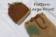 two crocheted purses sitting on top of a white sheet with the words pattern large print