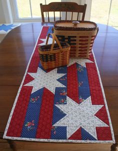 a table runner with a basket on it and an american flag design in the center