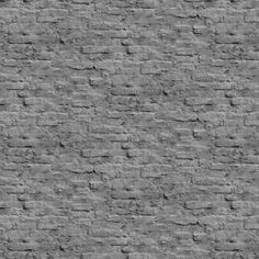 a black and white photo of a brick wall