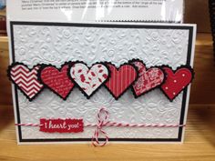 a handmade card with hearts on it