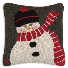 a pillow with a snowman on it