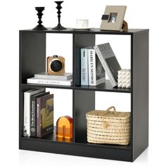 a book shelf with books and other items on it's sides, including a basket