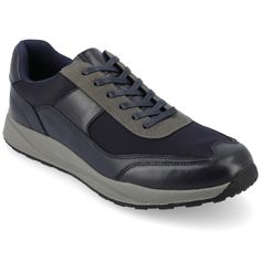 The Thomas sneaker from Vance Co. introduces a perfect blend of style and comfort, featuring a 1-inch sole, lace-up closure, and a classic round toe design. Crafted from a combination of faux leather and fabric this style offers a versatile and contemporary option for casual wear. The fabric lining, 6 mm Tru Comfort Foam™ footbed, and rubber outer sole ensure breathability, comfort, and support, making the Thomas sneaker a trendy and comfortable choice for everyday activities. Navy Lace-up Sneakers With Rubber Sole, Classic Navy Lace-up Sneakers, Navy Lace-up Sneakers With Contrast Sole, Classic Navy Plain Toe Sneakers, Navy Lace-up Leather Sneakers, Classic Blue Sneakers With Removable Insole, Navy Casual Sneakers With Plain Toe, Navy Casual Sneakers For Walking, Navy Casual Sneakers