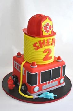 a birthday cake made to look like a fire truck