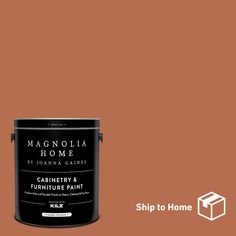 a brown paint can with the words magnolia home on it and an image of a house