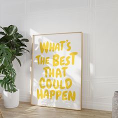 a poster with the words, what's the best that could happen? on it next to a potted plant