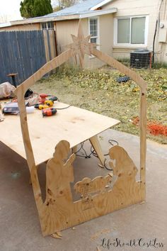 a nativity scene made out of plywood and wood