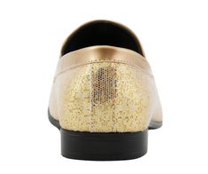 Treat your feet to pure luxury with the classic Amali Sutton men's glitter shoes from Just Men’s Shoes. These mens gold glitter loafers bring modern style blended with classic sophistication for the perfect look. Made with a sheen glitter upper which is complemented by a simplistic metal bit and sleek block heel - gives you a look that is both fashionable and formal. With its signature mid-top design, these mens’ smoking slippers will give any outfit an eye-catching accent. Whether you are atten