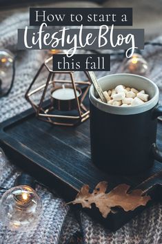 a cup of coffee with marshmallows in it and the words how to start a lifestyle blog this fall