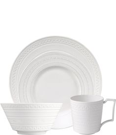 a white dinner set on a white background