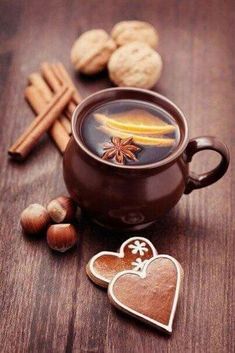 a cup of hot chocolate with cinnamons and spices