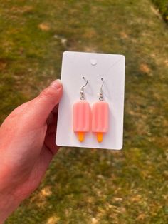 Cute and trendy popsicle earrings that come in 7 different colors and gold and silver earring hooks! They would be a great and unique gift!  *Please double check your shipping address. -some of these popsicle charms have a "sticky" residue -instagram:@moonlightshopstudio -gmail: moonlightshop78@gmail.com Rectangular Summer Earrings As Gift, Popsicle Earrings, Novelty Multicolor Summer Earrings, Handmade Multicolor Kawaii Earrings, Multicolor Novelty Earrings, Cute Food Earrings, Fun Earrings, Gold And Silver, Popsicles