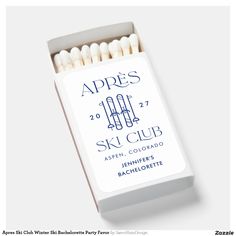 an unopened box of matches with the words apres on it and two white matches