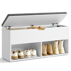 a white shoe storage unit with four pairs of shoes in it and one pair of boots on the bottom shelf