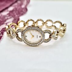 Wrist Watch for Woman, Gold Colour, Diamond Stones on Dial, Dainty Watch, Easy Usage, Stylish Design, Charismatic Design, Rectangle Design, Pearl Design Dial, Cool Design, Christmas Gift, Mother's Day Gift, Valentine's Day Gift Total Length: 20 cm Case Diameter: 23 x 20 mm Case Thickness: 6 mm Weigth: 40 gr Gold Oval Watches As Gifts, Gold Oval Watches For Gift, Gold Wrist Watch, Oval Gold Watches For Gifts, Pearl Design, Women Wrist Watch, Diamond Stone, Womens Watches, Jewellery And Watches