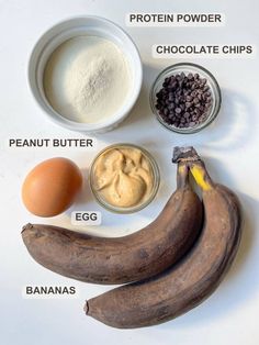 ingredients to make chocolate peanut butter banana smoothie laid out on a white counter top