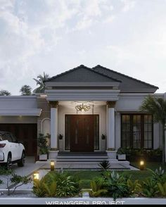 a white car is parked in front of a house with lights on the driveway and palm trees