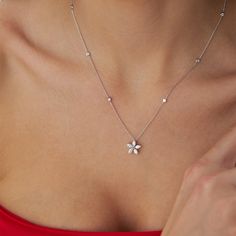 Introducing our stunning 18K White Solid Gold Flower Necklace, a radiant symbol of elegance and sophistication. Crafted with exquisite attention to detail, this breathtaking piece features genuine diamonds intricately set in a delicate floral design, creating an enchanting sparkle that catches the eye. 18 K  3.73 grams Diamond: 0.76 Ct Color:F Clarity: SI  Perfect for the discerning bride or anyone seeking timeless beauty, this Bridal Diamond Necklace exudes a sense of grace and luxury. Whether