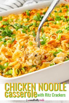 chicken noodle casserole with green onions and carrots in a white dish