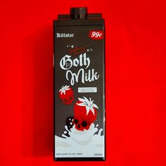 a carton of dark milk with strawberries on the front and bottom, against a red background