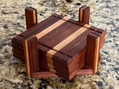 a wooden object sitting on top of a counter