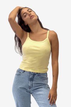 Our combed cotton baby rib is made of soft 30 singles yarn and stretches up to 2 times its original size. This 100% cotton style shrinks 7% in wash and this style has been designed to fit before and after wash. Made in the USA by workers earning fair wages. | Baby Rib Spaghetti Tank for Women in Baby Yellow, Size XL